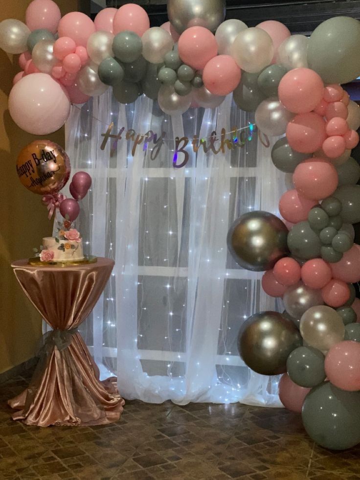 a birthday party with balloons and decorations