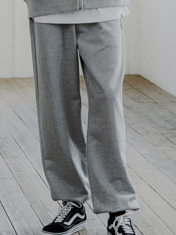 Editor's Notes Comfy and basic jogger sweatpants made of 100% cotton.- Banding closure- Pockets at the side- Drawstring at the waist- Thermal- Soft-touchMeasurements(in.)M/L- Total length: 39.27 in. / 40.15 in.- Waist: 12.99 in. / 14.17 in.- Thigh: 12.20 in. / 12.99 in.- Front rise: 14.17 in. / 14.56 in.- Hem: 4.33 in. / 4.72 in.Model infoMan - Height: 6'06 Fitting size LComposition & Care- 100% Cotton- Hand wash in cold water- Do not bleach- Do not tumble dryDesigner- by CAMELWORK Gray Sweats With Elastic Waistband For Jogging, Baggy Gray Joggers For Jogging, Gray Baggy Sweatpants For Leisure, Cotton Wide Leg Sweatpants For Jogging, Gray Athleisure Sweatpants With Straight Hem, Gray Athleisure Sweatpants For Leisure, Sporty Gray Pants With Straight Hem, Gray Full Length Athleisure Sweatpants, Full-length Cotton Sweatpants For Everyday