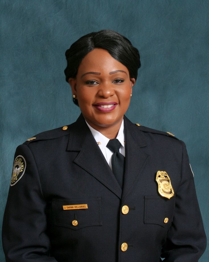 a woman in uniform posing for a photo