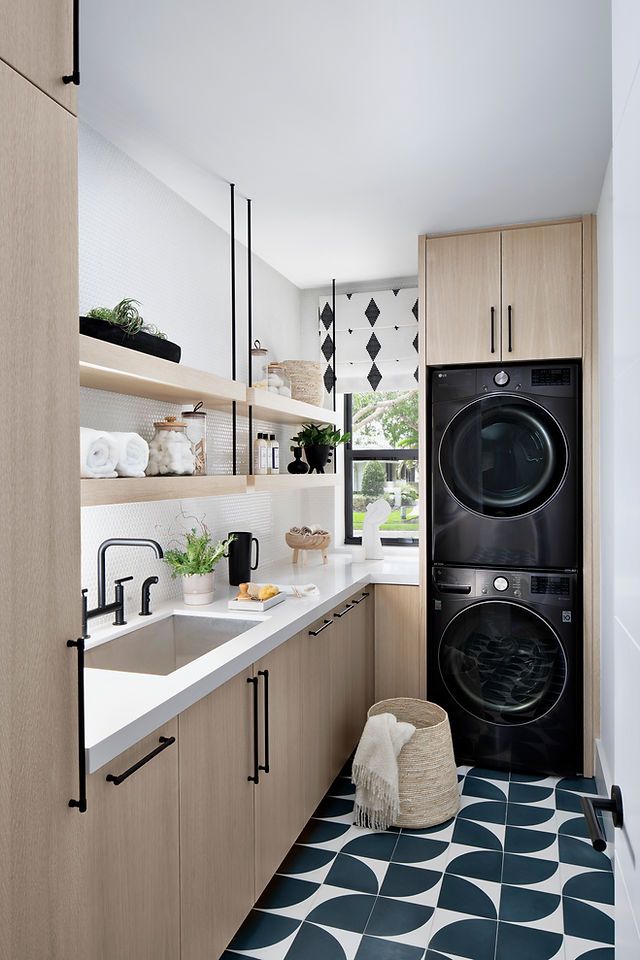 a washer and dryer in a small kitchen