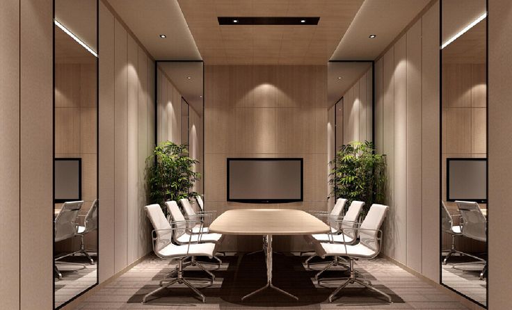 an empty conference room with white chairs and a tv on the wall in front of it