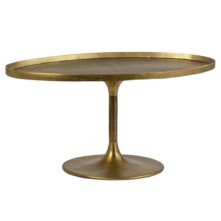 an oval metal table with a gold base