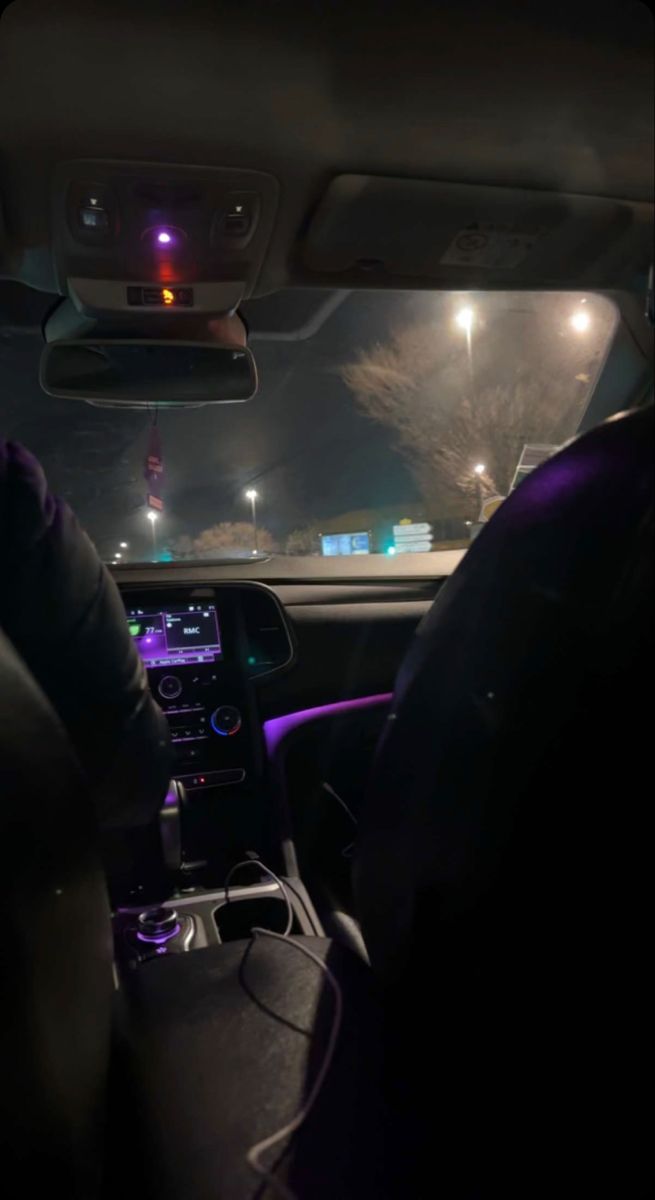 the interior of a car at night time