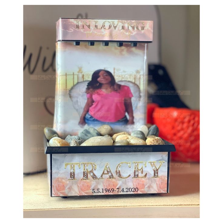 a box that has rocks in it and the words tracey on top of it