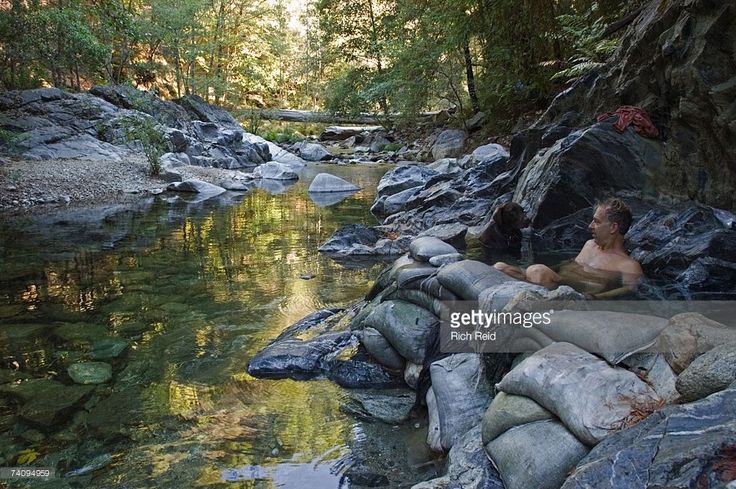 Ventana Wilderness, Big Sur, California. A man and his dog enjoy Sykes ...