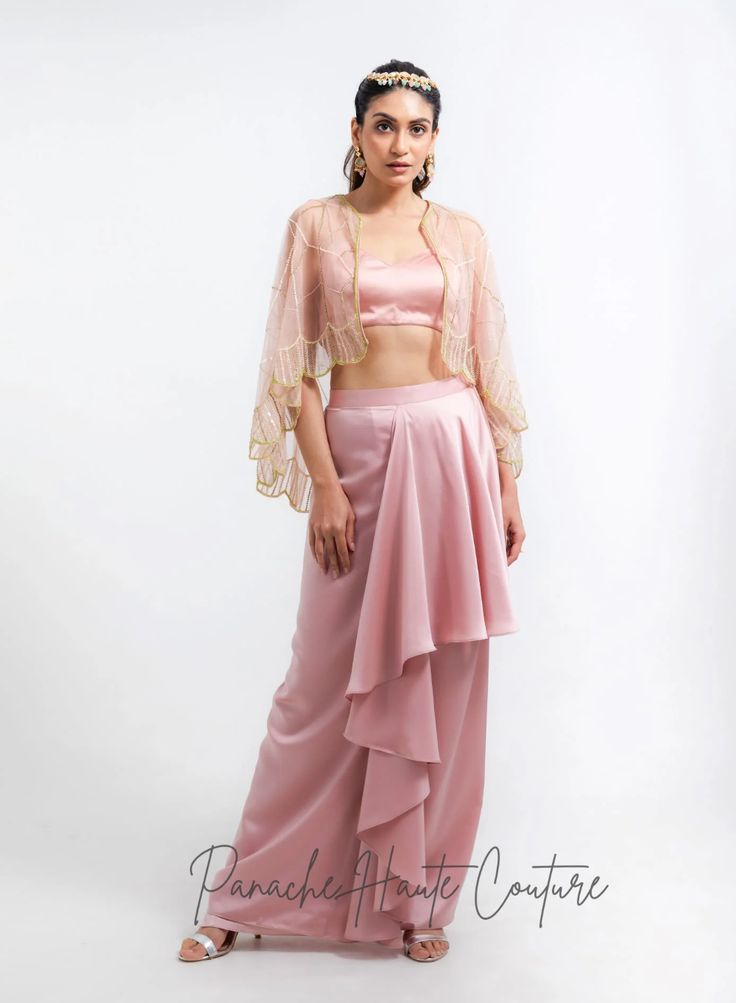 Dusty Pink Color Dhoti Skirt with Cape – Panache Haute Couture Silk Bollywood Draped Sharara, Festive Draped Silk Sharara, Evening Draped Sharara With Unstitched Blouse, Draped Art Silk Sets With Dupatta, Silk Draped Skirt For Wedding With Traditional Drape, Silk Draped Party Wear Dress, Silk Draped Dress For Party Wear, Silk Draped Sets For Diwali, Diwali Draped Silk Sets