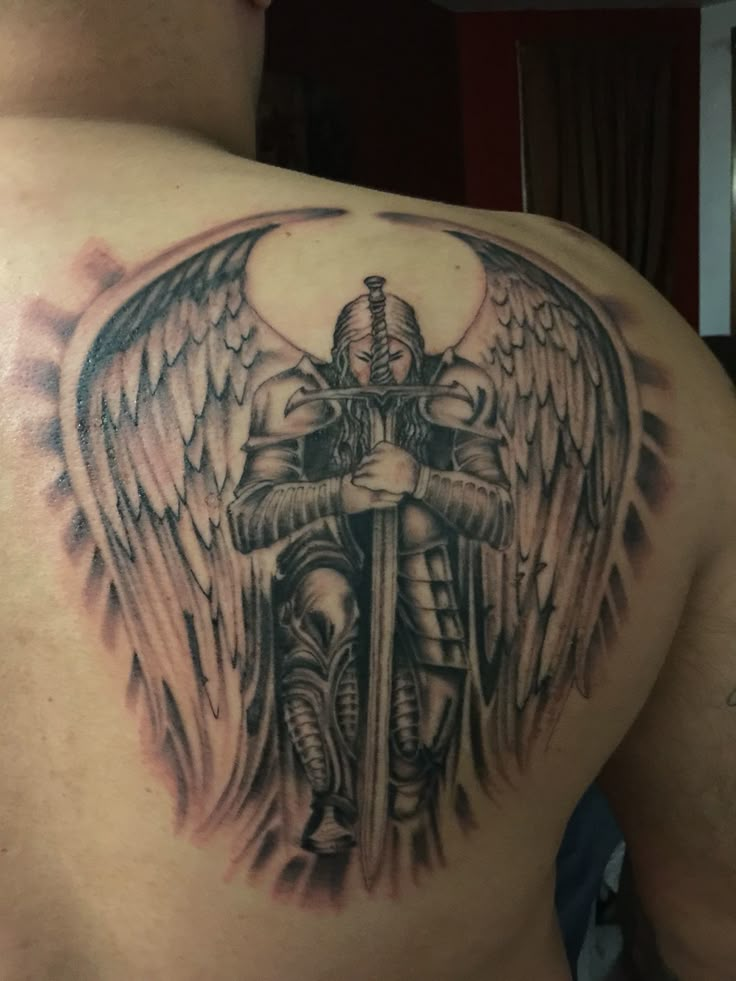 Guardian Angel Tattoo by Mad Tatter Angel Back Tattoo, Guardian Angel Tattoo Designs, Archangel Michael Tattoo, Tattoo Homme, Guardian Angel Tattoo, Archangel Tattoo, Knight Tattoo, Kunst Tattoos, Angel Tattoos