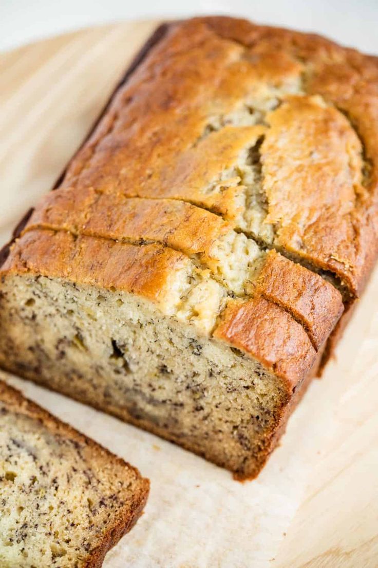 a loaf of banana bread on a cutting board