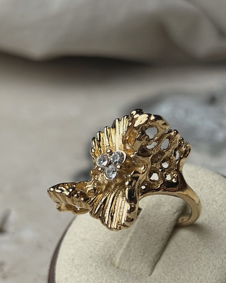 Vintage Abstract Gold Cocktail Ring Gold Diamond Ring With Rhinestones, Gold Cubic Zirconia Flower Ring For Promise, Gold Cubic Zirconia Flower Promise Ring, Yellow Gold Crystal Ring With Stone Setting, Fine Jeweled Rings, Gold Flower Ring With Stone Setting For Gift, Gold Flower Ring With Stone Setting As Gift, Elegant Gold Diamond Ring, Yellow Gold Ring With Stone Setting