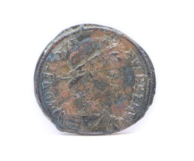 an old coin is shown against a white background