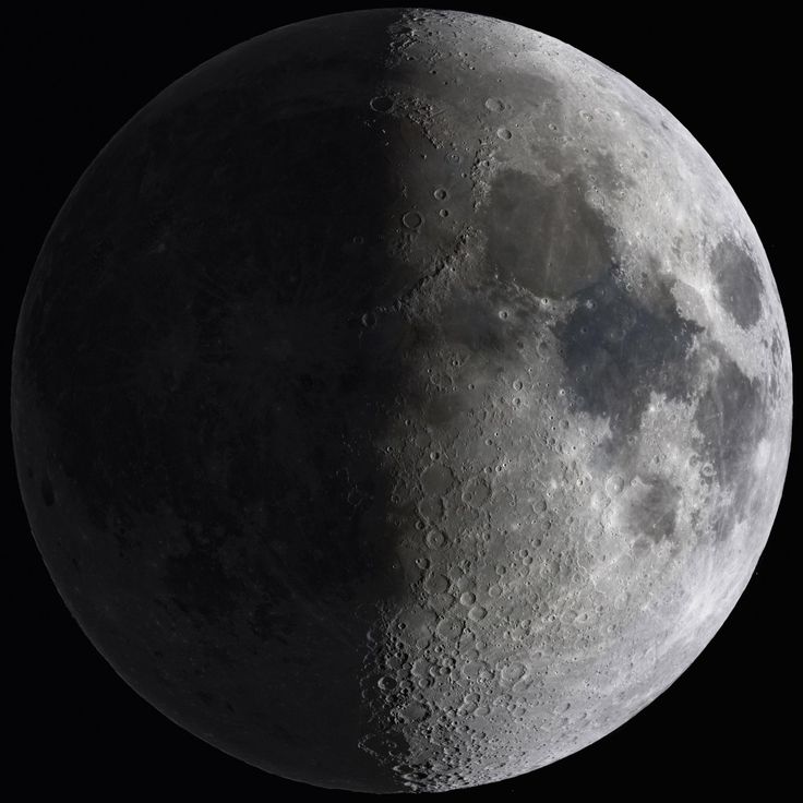 the moon is shown in black and white