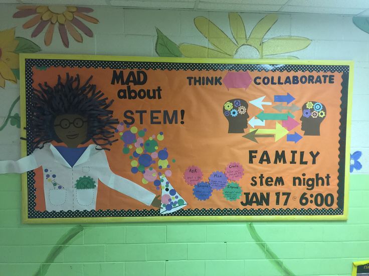 a bulletin board with an image of a woman in lab coat and name on it