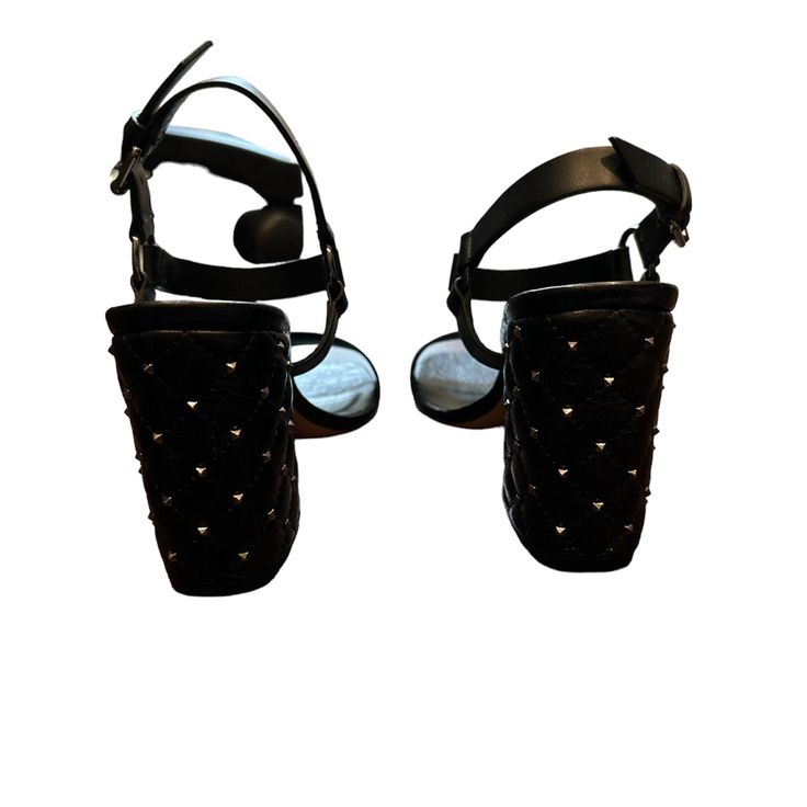 Expertly Crafted From Suppler Leather, These Rockstud Spike Sandals From Valentino Garavani Feature An Open Toe, A Strappy Design, A Branded Insole, An Ankle Strap With A Side Buckle Fastening, Micro Silver-Tone Rockstuds And A Quilted Mid-Block Heel. Made In Italy Composition Outer: Leather 100% Lining: Leather 100% Sole: Leather 100% Luxury High Heel Sandals With Studded Outsoles, Leather Embellished Evening Sandals, Leather Embellished Sandals For Evening, Luxury Studded Sandals For Party, Luxury Studded Party Sandals, Embellished Leather Sandals For Evening, Evening Sandals With Studded Rubber Outsoles And Open Heel, Embellished Leather Sandals With Open Heel, Designer Heels With Ankle Strap And Studded Outsoles