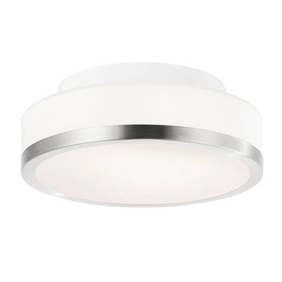 a white ceiling light on a white wall