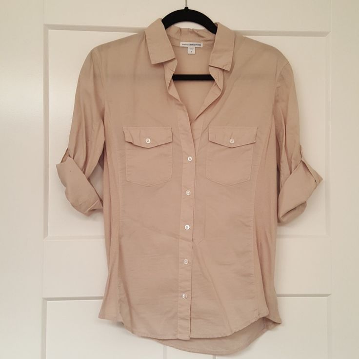 Brand New Without Tags. Never Worn, Only Tried On. Bought It From Bloomingdales Years Ago. Button Down Roll Up Sleeves Shirt In Beige/Tan Color. James Peres Is A Contemporary Brand Not Junior. I Had To Pick Size 2 Since Standard Sizing Doesn't Offer Size 3 On Poshmark. Fitted Button-up Blouse With Roll-up Sleeves, Fitted Beige Shirt With Pockets, Fitted Blouse With Pockets And Spread Collar, Beige Roll-up Sleeves Top For Work, Roll Up Sleeves, Tan Color, Shirt Sleeves, Button Down Shirts, Button Downs