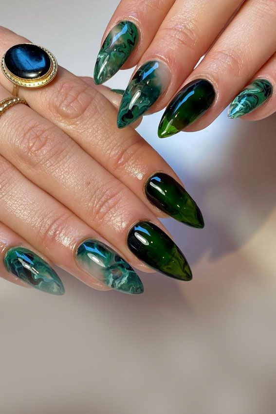 26. Green Jelly & Marble Green Nails The Eco-Friendly & Eye pleasing nail shade is urging this season. Everything from sage green nails, olive... Jelly Marble Nails, Camouflage Nails, Olive Nails, Green Jelly, Emerald Nails, Neon Green Nails, Witchy Nails, Nails Yellow, Green Nail Designs