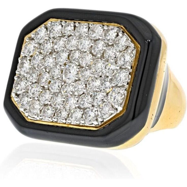 This exquisite David Webb Diamond Cluster Large Impressive Statement Ring is a true showstopper that will leave everyone in awe. Designed with meticulous craftsmanship, this ring showcases a dazzling array of larger pave set diamonds that radiate an incredible sparkle. It's the kind of ring that demands attention and makes a bold statement wherever you go.With approximately 6 carats of round cut diamonds beautifully mounted in a black enamel surround, this ring exudes a sense of luxury and elega Luxury Diamond Signet Ring, Luxury Cluster Rings With Pave Setting, Luxury Cluster Diamond Ring With Single Cut Diamonds, Luxury Cubic Zirconia Signet Ring With Brilliant Cut, Luxury Cluster Ring With Cubic Zirconia, Luxury Cubic Zirconia Cluster Ring, Luxury Diamond White Diamond Signet Ring, Luxury Cluster Ring With Pave Setting For Formal Occasions, Luxury Cluster Ring With Polished Finish