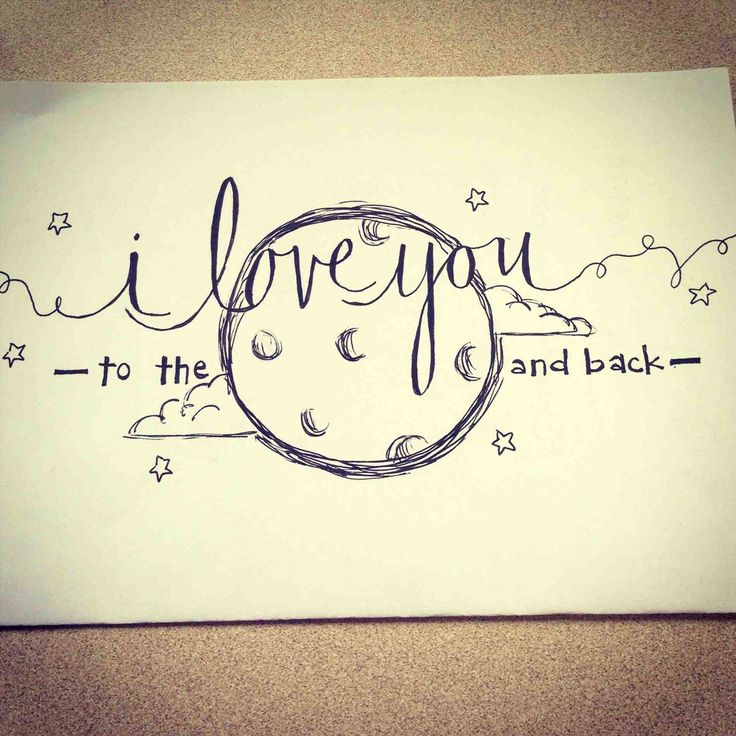 i love you to the moon and back written in cursive writing on paper