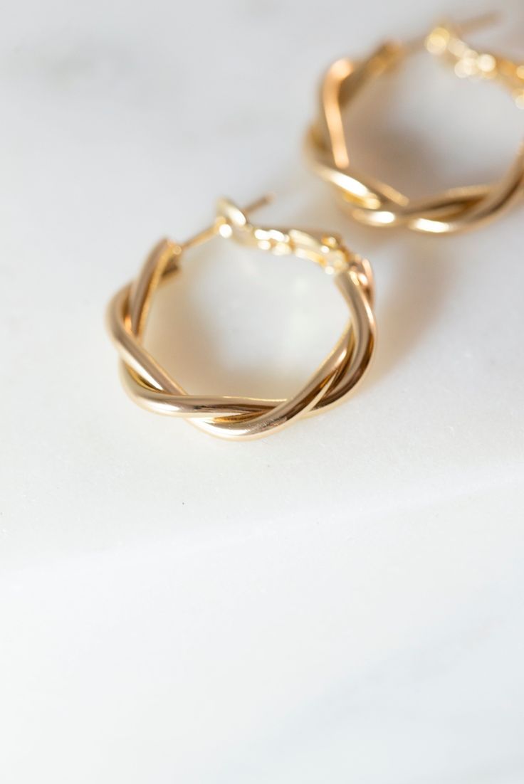 [PaidLink] Our Dainty Twisted Hoop Earrings Are A Perfect, Minimalist Earrings To Add To Any Outfit! Made With 14K Gold Filled Metal, And Measure 27Mm X 28Mm. Available In Gold. Lead And Nickle Free. #goldminimalistjewelry Twisted Gold Hoop Earrings, Gold Twist Hoop Earrings, Pretty Jewellery Earrings, Gold Hoop Earrings Aesthetic, Trendy Gold Earrings, Everyday Gold Jewelry, Small Business Women, Gold Minimalist Earrings, Minimalist Gold Jewelry