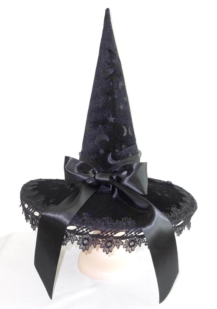 a witches hat with black lace on it