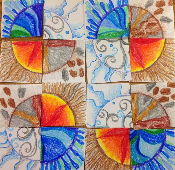 four different colored drawings on paper with the sun and clouds in each one's center