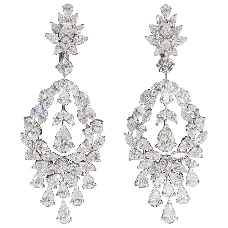 Beautiful diamond drop earrings in a stunning design. 22.05 carats of diamonds, the center pear shape drops measure as carat sizes. 18k white gold Approximately 2.63 inches in length, an inch wide at its widest point. Made in New York Antique Diamond Earrings, Color Stone Earrings, Carat Sizes, Real Diamond Earrings, Diamond Chandelier Earrings, Diamond Chandelier, Cocktail Earrings, Accessories Board, Designer Diamond Jewellery