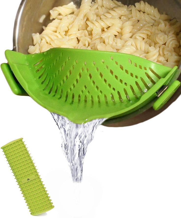 a colander strainer filled with pasta and water