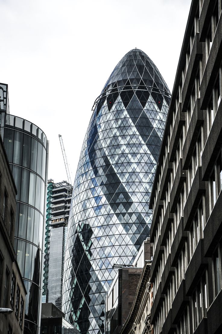 the ghere building is next to other tall buildings in london's city