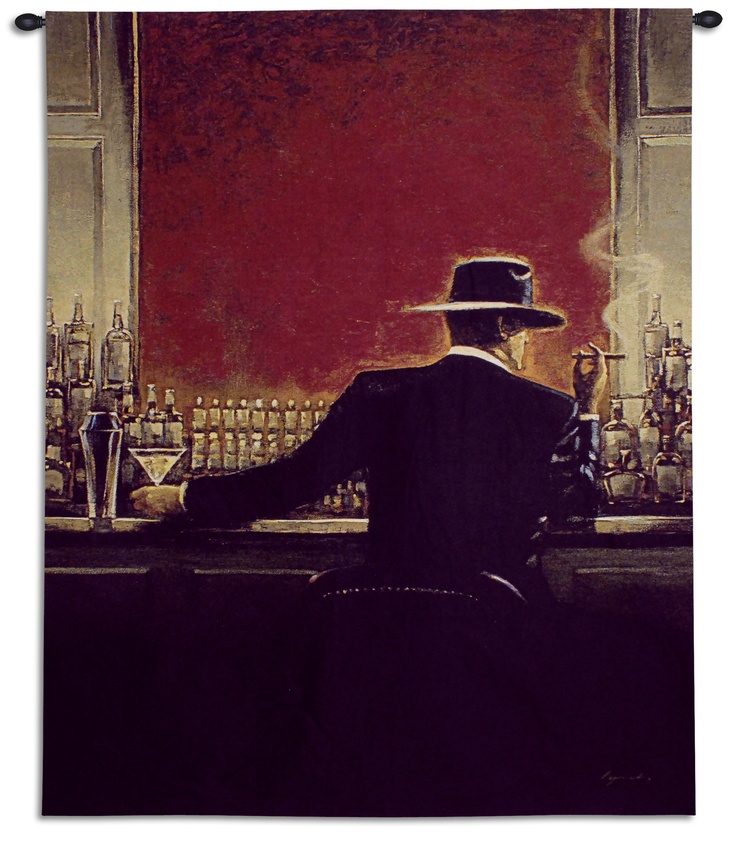 a man sitting at a bar wearing a hat