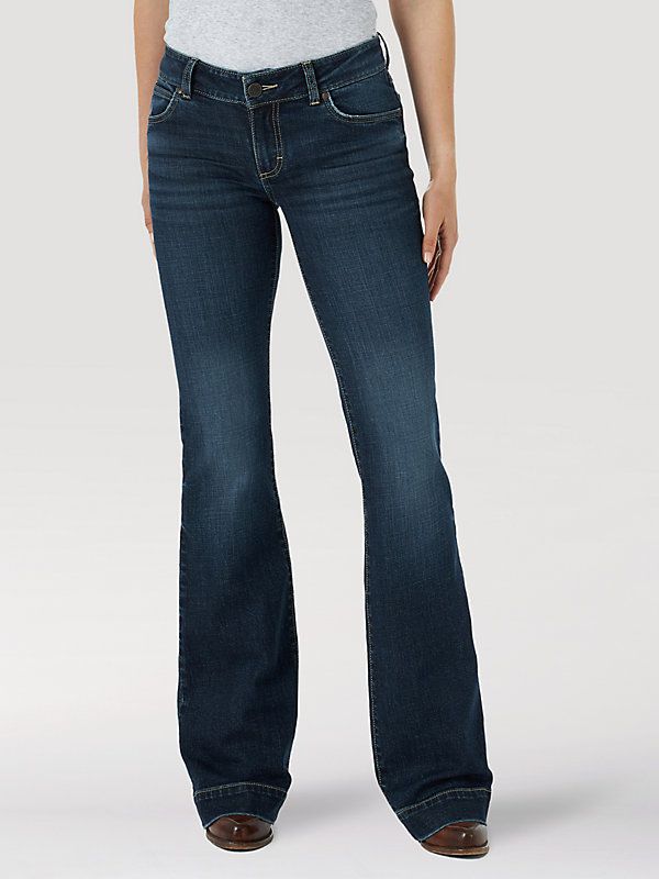 THE TROUSER: THE ULTIMATE IN WOMEN'S RETRO® JEANS Like all Wrangler Retro® jeans, our Mae wide-leg trouser jean is marked by its Western authenticity, making it a go-to style for cowgirls everywhere. With its contour waist and mid-rise fit, these women's trouser jeans are made to fit comfortably while they flatter all your curves. With more room at the knee and a gradual opening down the leg, the Mae wide-leg trouser gives you the room you need to stay active and in style. Surprise Dance Outfits, Womens Trouser Jeans, Jean Fits, Retro Jeans, Dark Wash Denim, Trouser Jeans, Dance Outfits, Wide Leg Trousers, Wide Leg Jeans