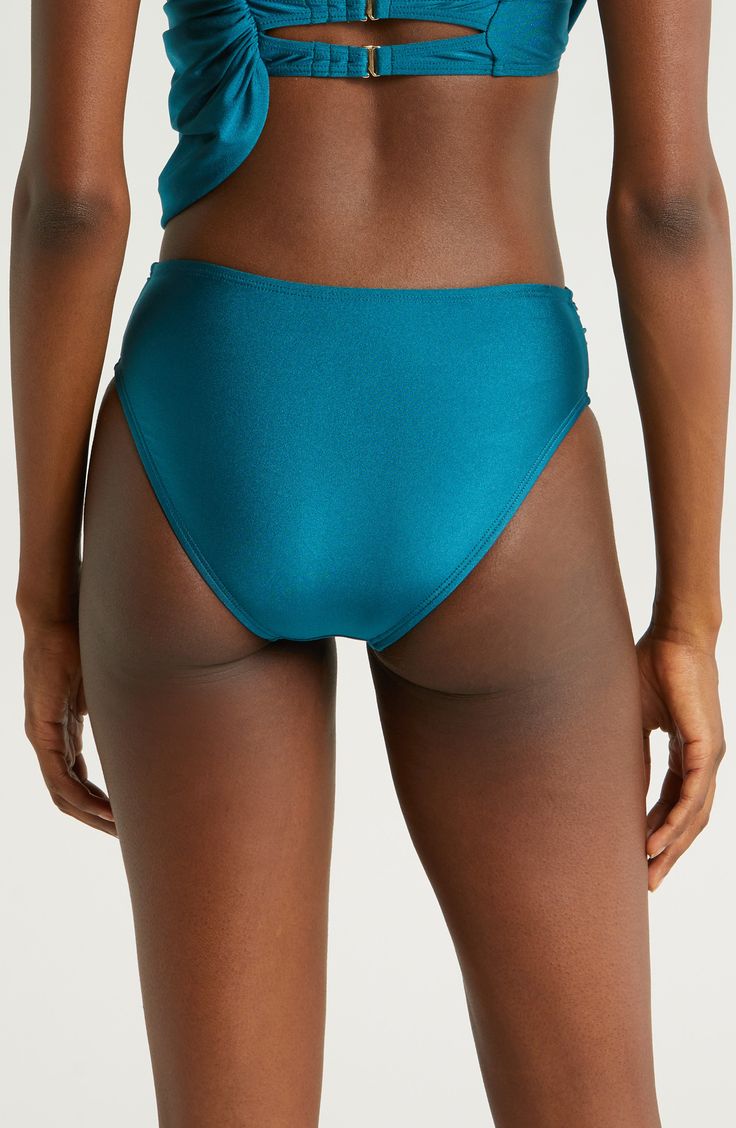 A draped, high waist sweetly shapes these bikini bottoms styled with a classic fit, versatile solid hue and moderate back coverage. Moderate back coverage Lined 82% nylon, 18% spandex Hand wash, dry flat Imported Seamless Tie-side Bottoms For Beach Season, Fitted Swimwear With High-cut Leg And Moderate Back Coverage, Solid Color High Waist Swimwear With Wide Waistband, Seamless Tie-side Bottoms For Poolside, High-cut Leg Swimwear, Seamless Tie-side Bottoms For Pool, Seamless Tie-side Pool Bottoms, Solid High Waist Seamless Swimwear, Solid Color High Waist Seamless Swimwear