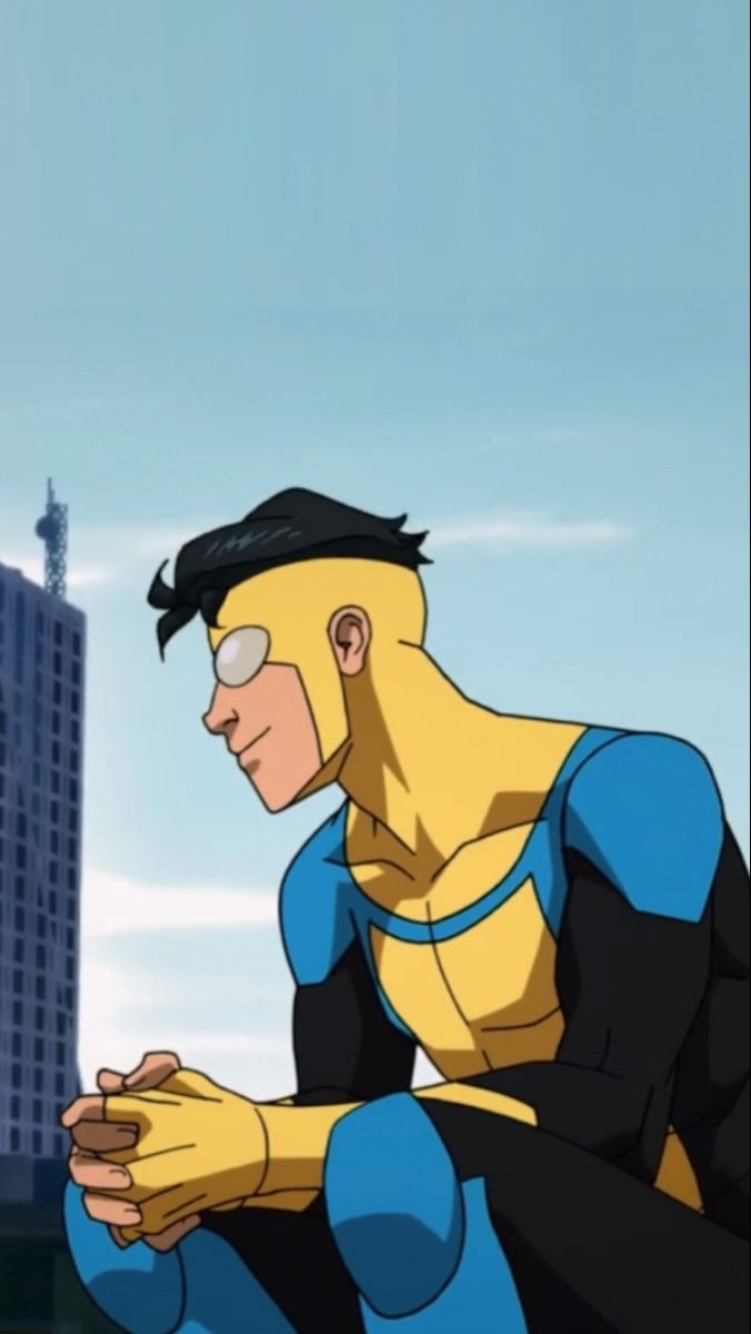 a cartoon character sitting on the ground in front of a tall building with buildings behind him