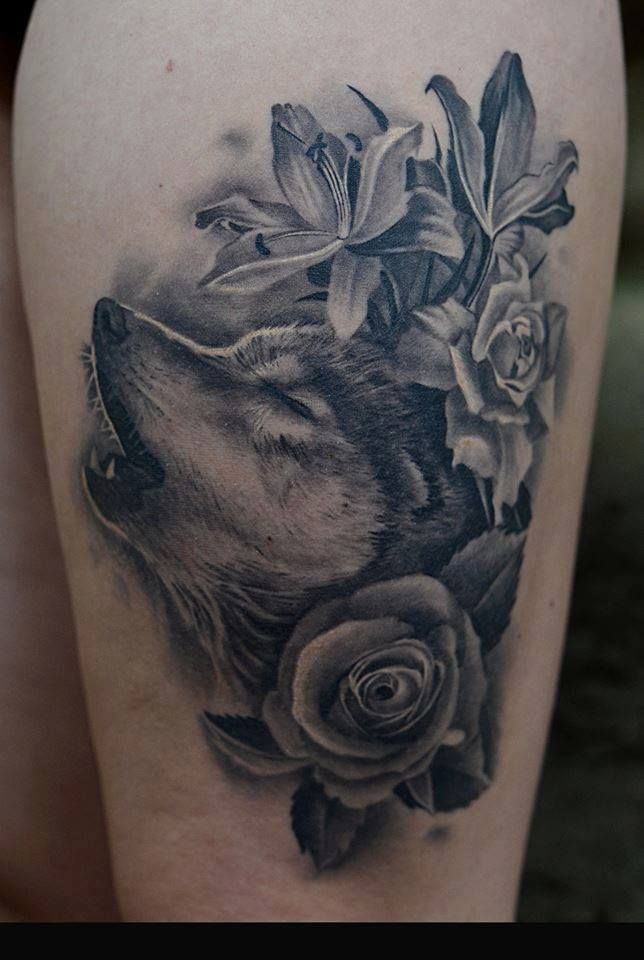 Black and gray realistic wolf tattoo with roses and lilies by Angle ...