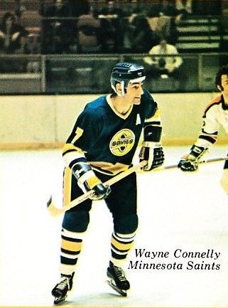 the hockey card shows wayne conely and minnesota saints'goalie, who are playing for