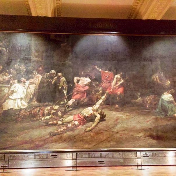 a large painting on display in a museum