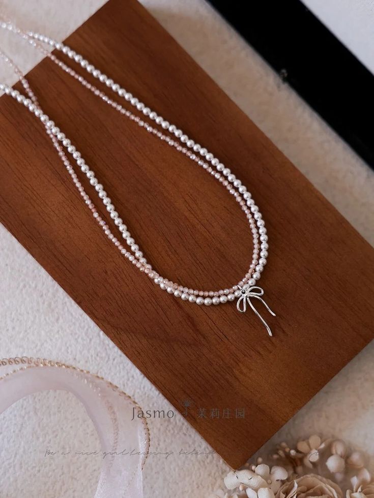 Bow Pendant Double Strand Crystal Pearl Zircon Necklace | Jewelry | Three Fleas Coquette Diy, Thigh Chain, Bow Pendant, Zircon Necklace, Rings Necklaces, Crystal Pearls, Unique Charms, Necklace Jewelry, Ring Necklace