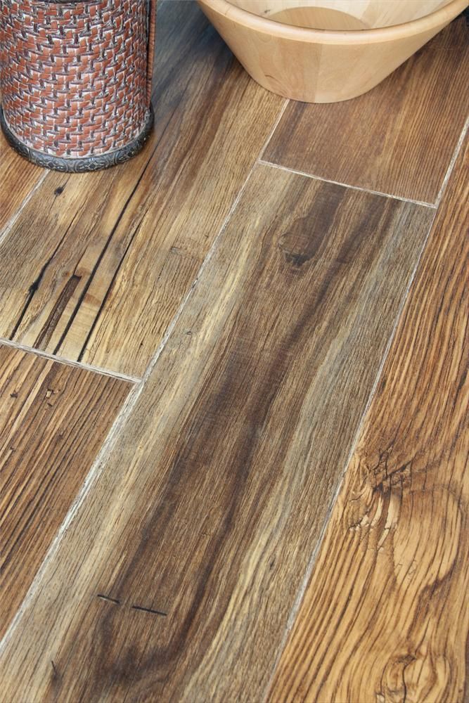 a wooden floor with a bowl on top of it