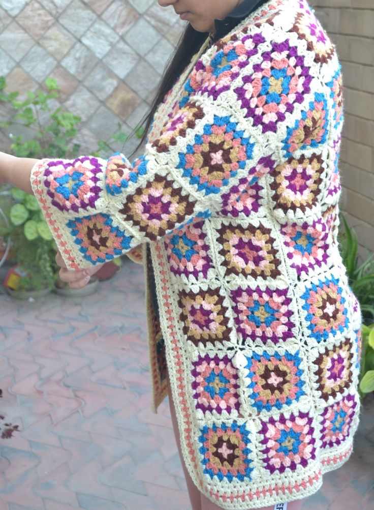 Handmade Crochet  Knit Colorful Winter  GRANNYs  sweater cardigan Measurements of this boho jacket cardigan gown : Size: Free size, i will send any size that you want Made of highest quality acrowool acrylic blend yarn Very stylish and fashionable  elegant and keeps you very warm Wash Instructions: Machine washable at low temperatures. -machine wash gentle (40 C/104 F) -tumble dry on low heat Unique designers print, handcrafted with love Great gift for yourself or for your loved ones Traditional Multicolor Cardigan For Fall, Multicolor Long Patchwork Cardigan, Traditional Multicolor Fall Cardigan, Hippie Long Multicolor Outerwear, Long Multicolor Hippie Outerwear, Fitted Multicolor Bohemian Outerwear, Hippie Multicolor Long Outerwear, Bohemian Long Sleeve Sweater With Granny Squares, Fitted Long Cardigan For Festivals