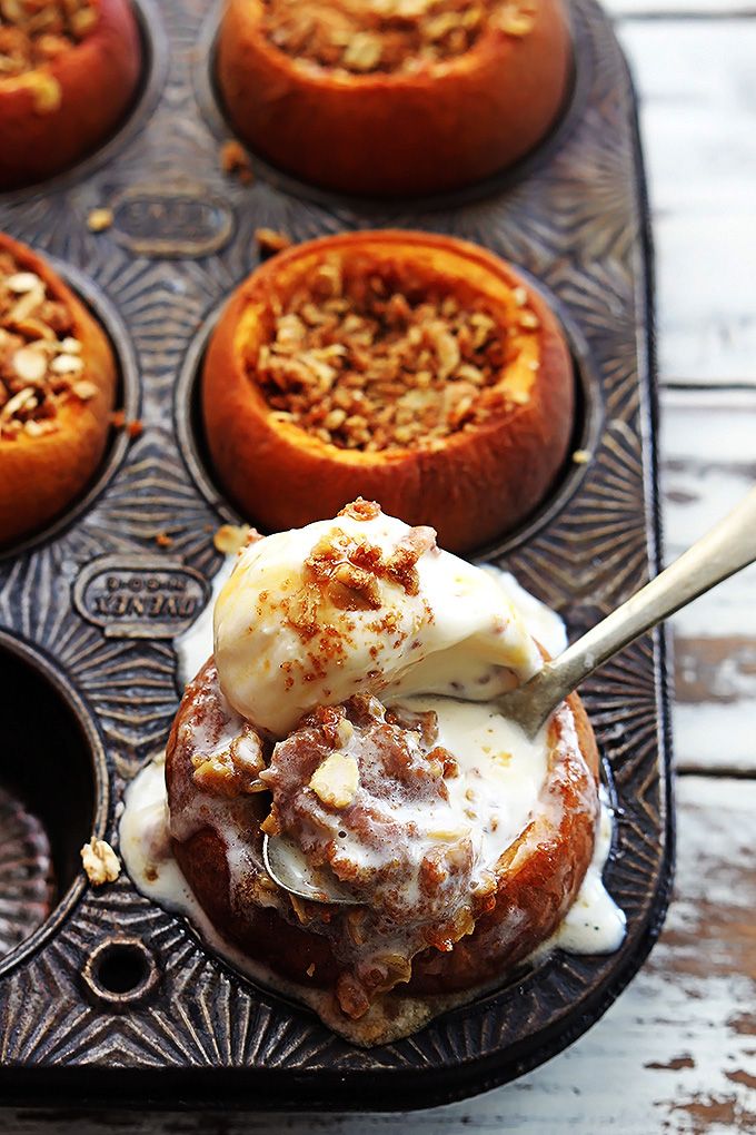 baked dessert items in muffin tins with spoon