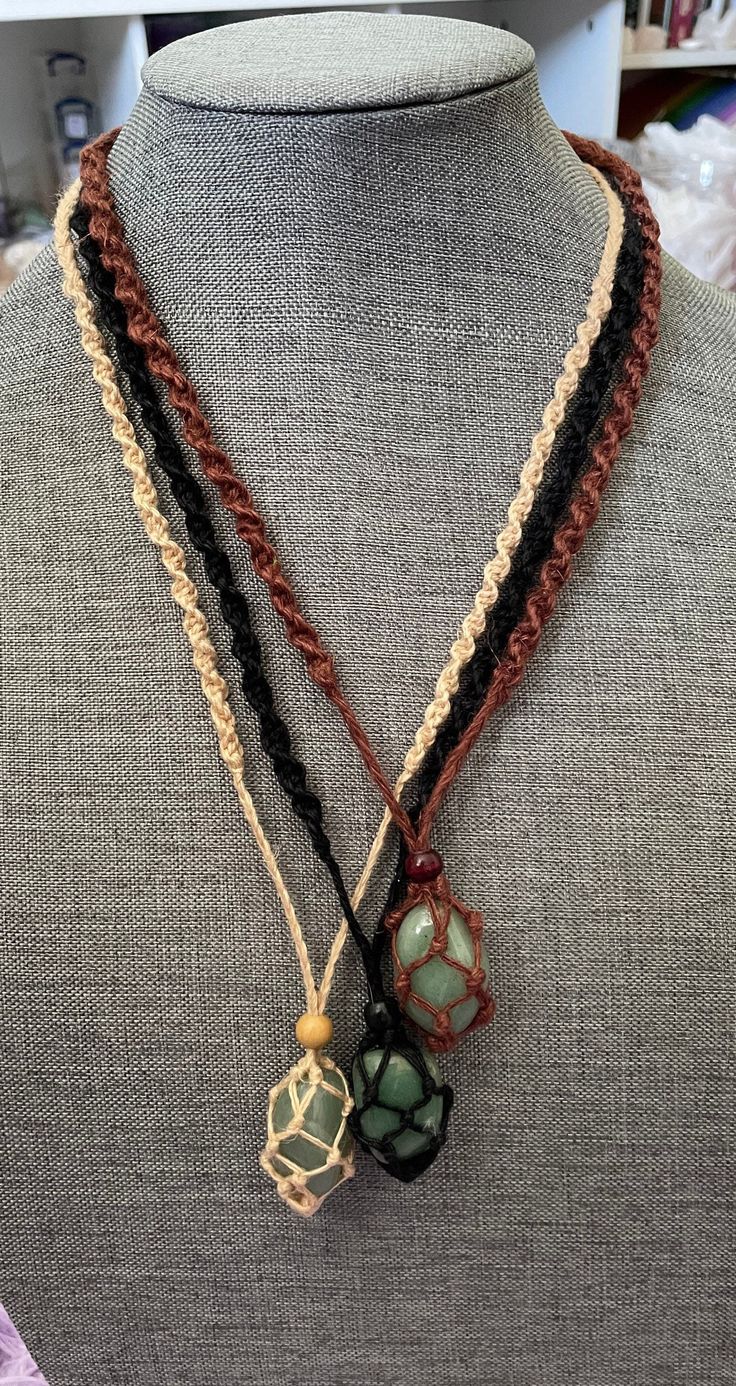 These one of a kind hemp macramé necklaces come in three colors: black, brown and tan, with one Aventurine stone. The necklace is 12-13 inches in length. None are exactly the same!! When you receive your necklace, it will be prefilled with one Aventurine crystal and will arrive safely in a pretty mesh pouch. Also included are crystal care and cleansing instructions along with a crystal properties card. All the Crystals I sell are cleansed, charged & well cared. They're perfect for metaphysical u Hemp Necklace Pattern, Men’s Crystal Necklace, Earthy Beaded Necklace, Cool Necklaces Unique, Earthy Necklace With Adjustable Cord For Healing, Cristal Necklace Diy, Crochet Crystal Necklace, Nature-inspired Brown Macrame Necklaces, Adjustable Brown Crystal Necklace For Healing