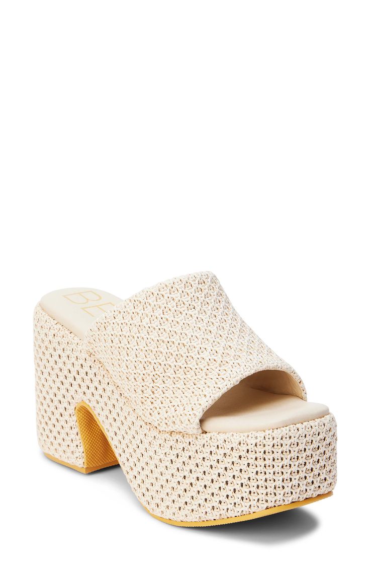 A woven finish adds abundant texture to an arch-supporting sandal set on a retro-chic platform sole. 4 1/4" heel; 2 1/2" platform Contoured footbed with arch support Synthetic upper, lining and sole Imported Beige Synthetic Wedge Sandals With Chunky Platform, Beige Synthetic Platform Slippers With Wedge Heel, Beige Synthetic Wedge Heel Platform Slippers, Beige Platform Sandals In Synthetic Material, Beige Synthetic Platform Sandals, Beige Platform Wedge Sandals With Open Heel, Beige Chunky Platform Sandals In Synthetic, Cream Open Toe Sandals With Textured Sole, Spring Cream Sandals With Arch Support