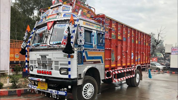 the truck is decorated with many different colors