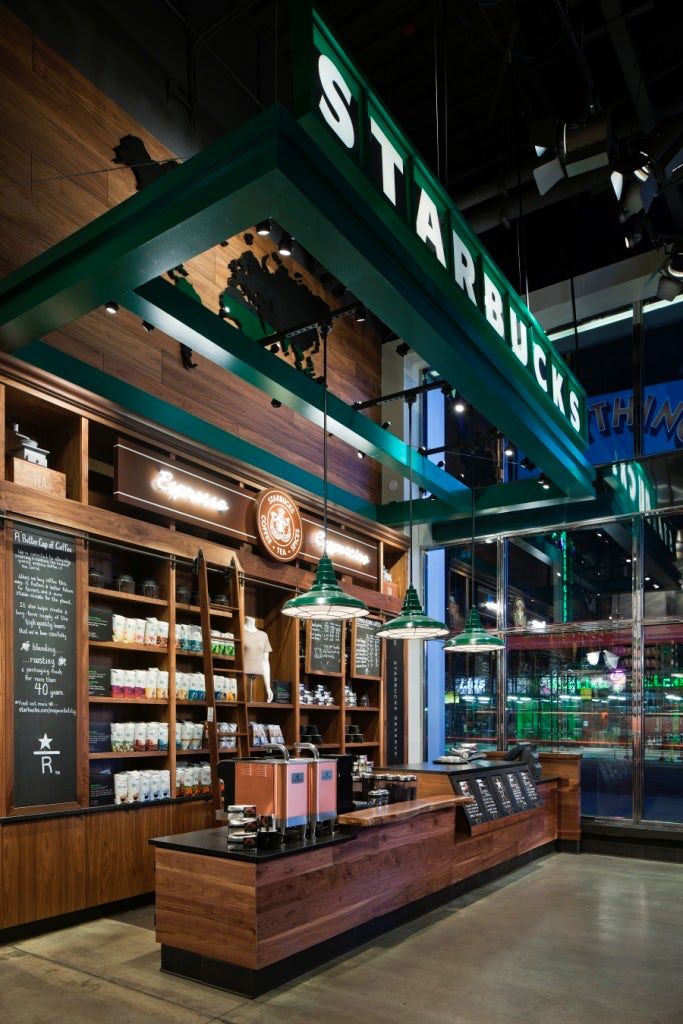 the inside of a starbucks coffee shop at night