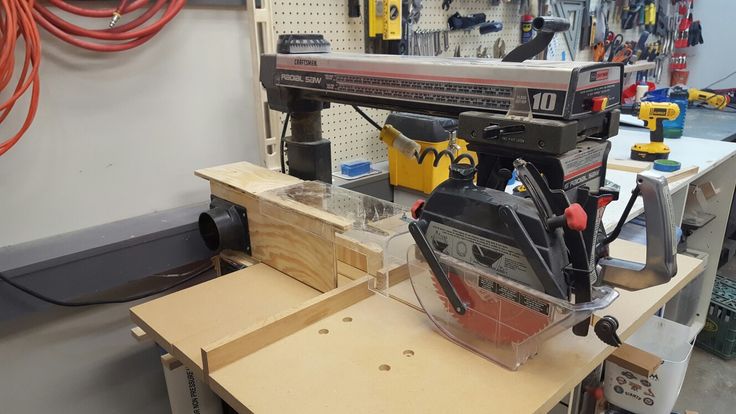 a workbench with tools on it in a shop