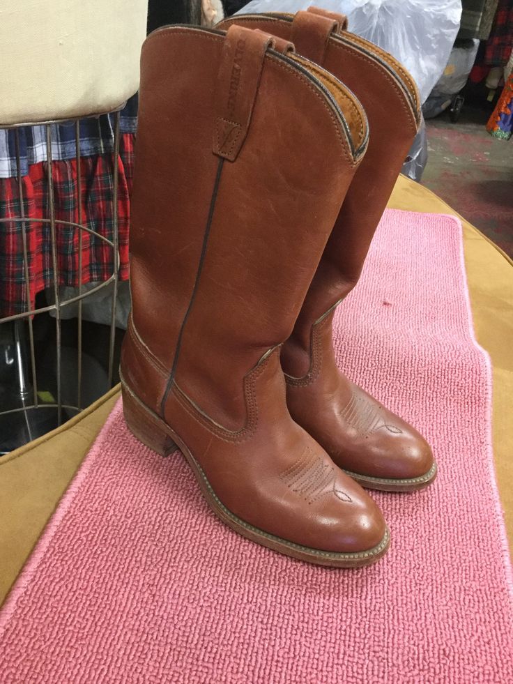 Heel looks like it has been redone Otherwise worn boots Label says wolverine Size 5 1/2 Leather on top of boots has nice stitching on the toe Rugged Winter Boots For Ranch, Rustic Work Boots For Rodeo In Fall, Rustic Snip Toe Winter Boots, Western Style Work Boots With Goodyear Welt For Fall, Western Style Winter Work Boots With Round Toe, Brown Sturdy Western Boots, Western Style Moc Toe Work Boots For Fall, Fall Moto Boots For Western-themed Events, Western Style Closed Toe Work Boots For Fall