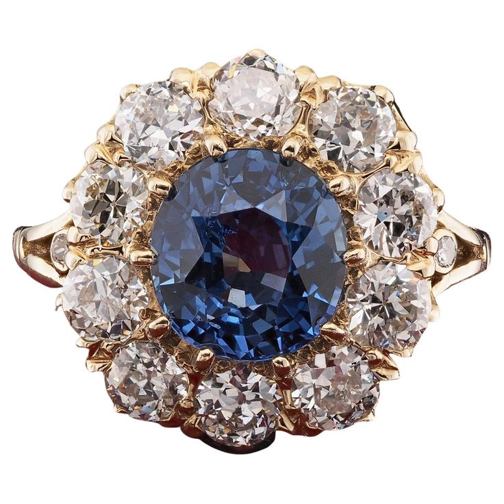 Victorian Tradition Spectacular Victorian period Diamond and Sapphire cluster ring which is in the tradition of the antique jewellery, 1890/1900 ca Hand crafted of solid 18 Kt gold in the classy cluster design in vogue at the time, lovely under-gallery work with an imposing cluster of gems facing up Centrally set with a stunning 3.60 Ct (8.71 x 8.16 mm.) Natural Sapphire of the most saturated Blue colour, 100% unheated /untreated, rare variety, Burma origin, with high degree for the exceptional Luxury Victorian Sapphire Ring In Yellow Gold, Luxury Sapphire Diamond Cluster Ring, Luxury Hallmarked Sapphire Cluster Ring, Luxury Heirloom Sapphire And Diamond Ring, Luxury Victorian Round Sapphire Ring, Antique Sapphire Ring, Sapphire Engagement Ring Gold, Antique Sapphire Rings, Sapphire Antique Ring