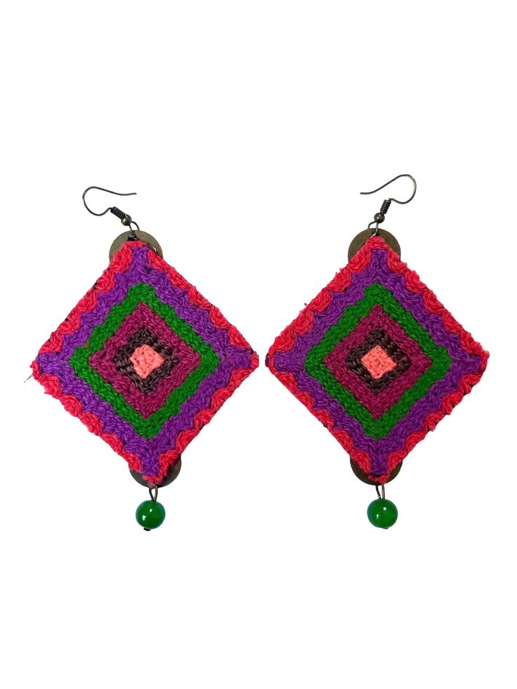 Roshan - Handmade Needlework Drop Earrings: Purple and Green Diamond Balochi Jewelry for your Spring Festival Roshan is a Persian name meaning "bright" or "light". Elevate your accessory game with our stunning Balochi needlework earrings. Each pair is a beautiful blend of tradition and modern flair, inspired by the vibrant cultures of Balochistan, spanning across Iran, Afghanistan, and Pakistan. Crafted with meticulous care by myself and my talented cousin, these earrings are more than just accessories - they're little pieces of art. The intricate needlework, painstakingly done stitch by stitch, tells a story of heritage and craftsmanship. It's a process that takes time and skill, but the result is truly worth it - each pair is a unique masterpiece. Whether you're adding a bohemian touch t