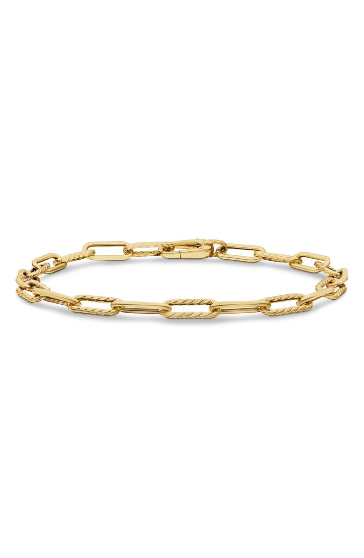 Finish off your look with this gleaming 18-karat yellow gold chain bracelet designed with a mix of solid and spiraling links. 7" length Lobster clasp closure 18k gold Made in Italy Luxury Yellow Gold Chain Bracelet With Hooks And Links, Yellow Gold Chain Link Bracelet With Hook And Links, Formal Yellow Gold Bracelets With Hook And Links, Classic Chain Link Bracelet With Spring Ring Clasp, Formal Gold Bracelet With Oval Link And Hooks, Formal Gold Oval Link Bracelet With Hook, Classic Gold Oval Link Bracelet With Hooks, Classic Gold Bracelet With Oval Link, Yellow Gold Link Chain Bracelet With Hook