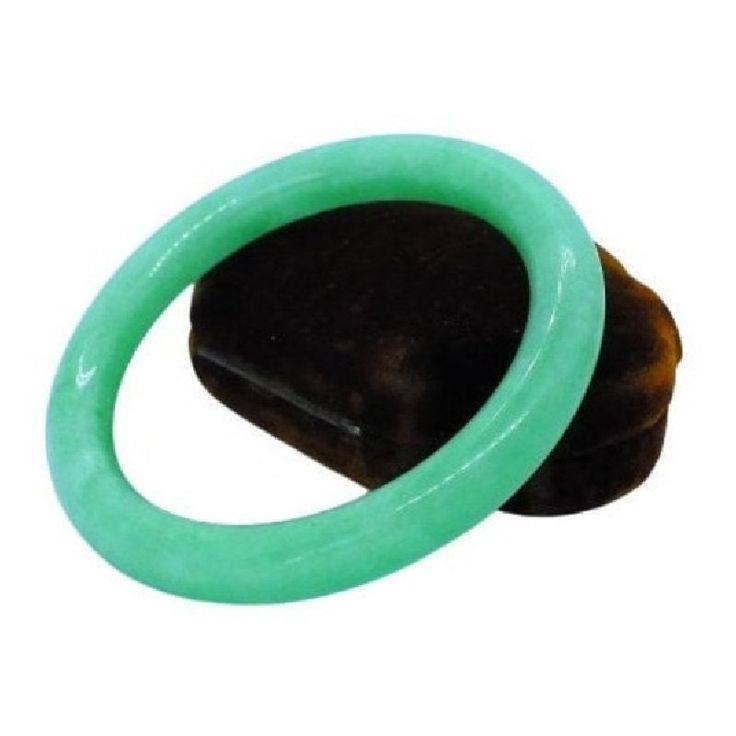 1980s. Lucky green jade hololith bangle bracelet. August birthstone bracelet. Green jade symbolizes purity and serenity, representing harmony and balance in life. It is believed to bring good luck, prosperity, and abundance to the wearer. In Chinese culture, green jade symbolizes immortality and longevity, often used in rituals and ceremonies. Green jade is highly valued for its spiritual significance and the positive energy it brings to those who wear it. Inner circumference 6 1/2 inches  Diameter 2 inches   Width 8.6 mm  Depth 8.3 mm  Love it ♡  Get it ☆  Get Lucky 💋 Vintage Spiritual Style Jade Bangle Jewelry, Spiritual Round Bangle With Natural Stones, Green Bangle With Natural Stones For Gift, Green Spiritual Bangle As A Gift, Spiritual Green Bangle Bracelet, Spiritual Green Bangle As A Gift, Adjustable Green Jade Bangle, Handmade Green Jade Bangle, Jade Gemstone Bangle Jewelry