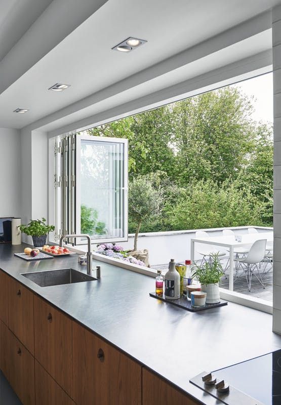 the kitchen counter is clean and ready for us to use in the day or night